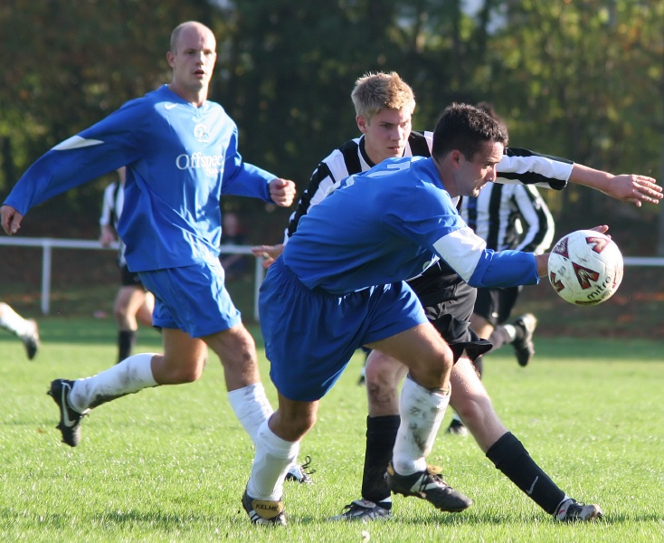 ... Jon Simpson (2) gets in front of him
