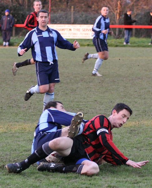 Dave Sharman is tackled
