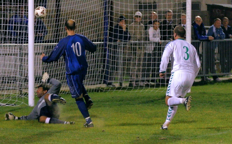 This Darren Annis shot hits the post
