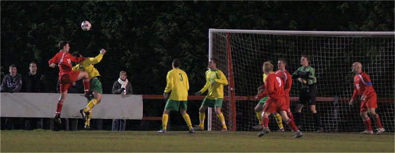 Nick Sullivan (?) gets a header towards goal
