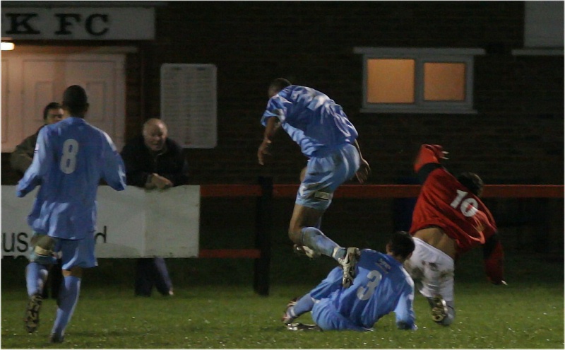 Tom Manton is brought down by Kenny Hewitt

