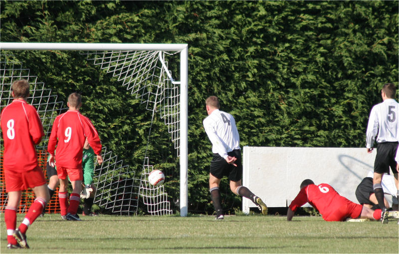 A Redhill attack is cut out by keeper Darren Prior
