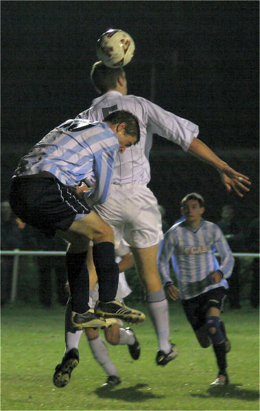 Chris Hall (5) jumps with Joe Shelley (10)
