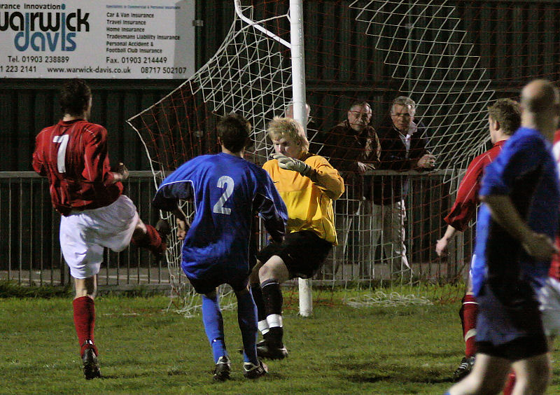 Jason Wimbleton shoots from close range ...
