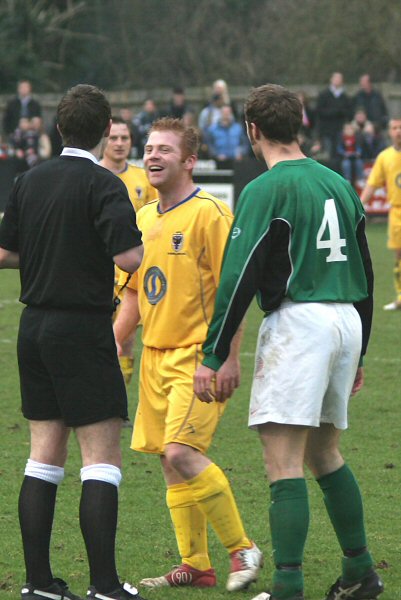 Gareth Graham shares a joke with referee Steven Cook as Iain Hendry listens in
